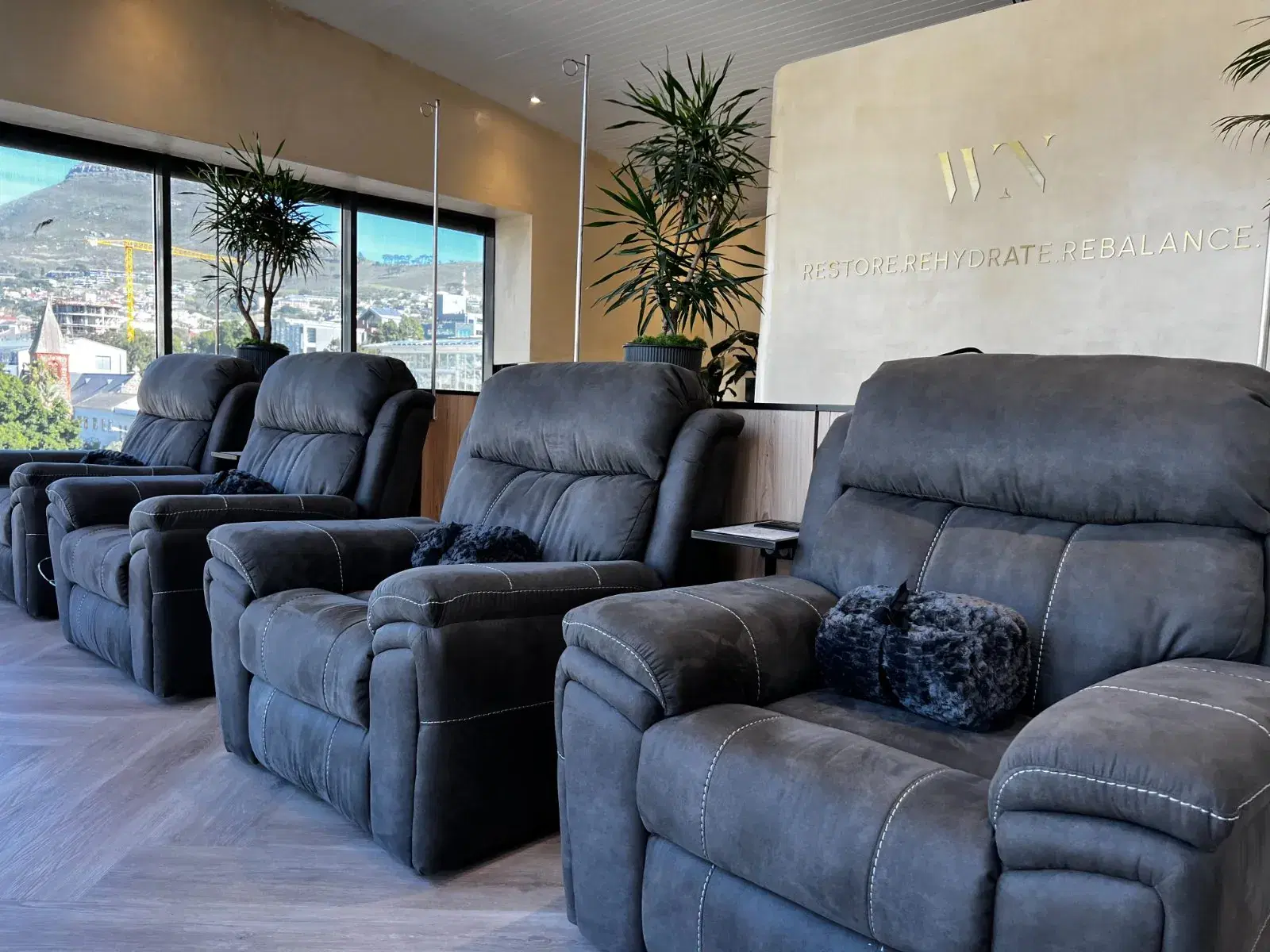 Recliner chairs in the WellNest treatment lounge.