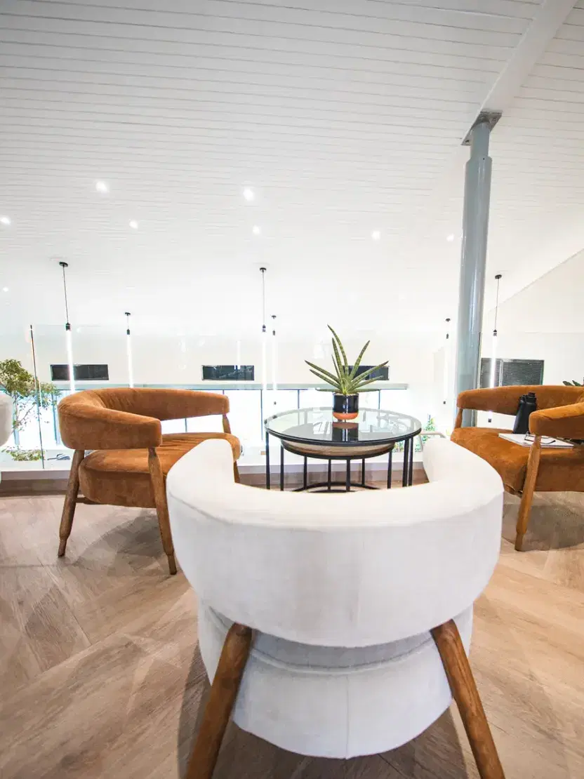 Armchairs in the upstairs lounge at WellNest