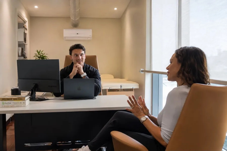 WellNest Gold physician consulting with a patient in the Cape Town clinic
